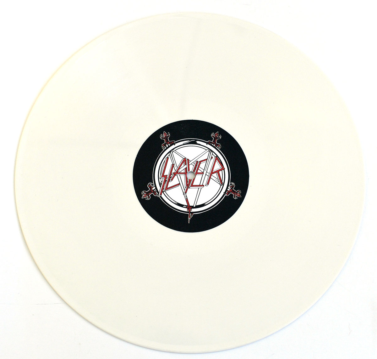 White vinyl record of Slayer's 'Show No Mercy' reissue featuring the Slayer pentagram logo on the Side B label.